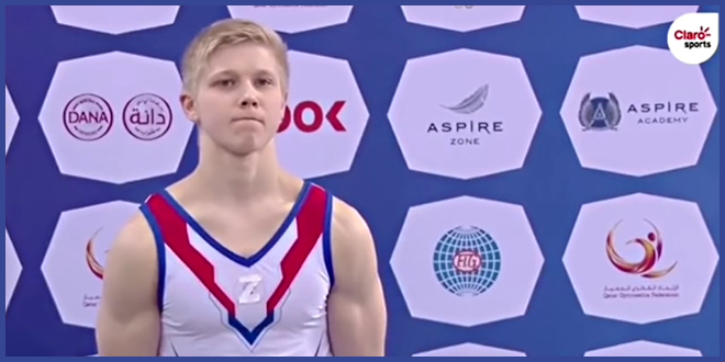 Российский спортсмен вышел на награждение с ＂новой свастикой＂ на груди